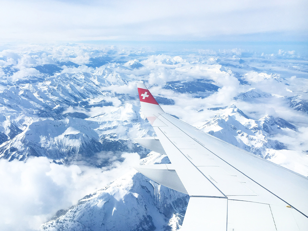 Snowy mountains from a plane
                